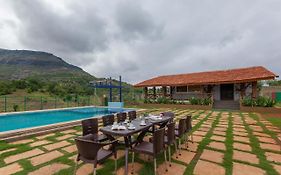 Stayvista's Ficus Farms - Mountain-view Haven With Rustic Artsy Interiors, Outdoor Pool, Glasshouse, Home Theatre & Karaoke Delight Igatpuri India